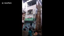 Video shows moment house crumbles to ground in India village after heavy downpour