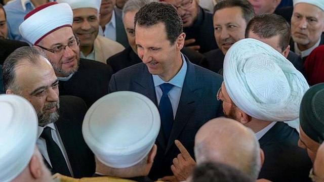 Watch: Syria's Bashar al-Assad attends morning prayers