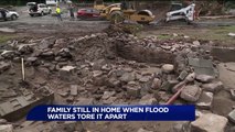 Family Rescued After Home Flood Waters Swept Home Off Foundation