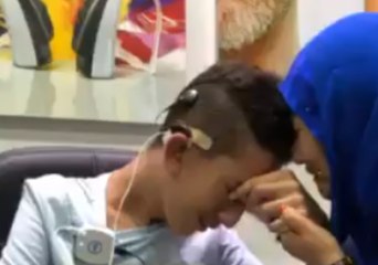 Mom's Cries Tears of Joy as Teenage Son Hears After Treatment