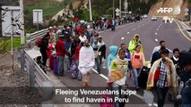 Venezuelan migrants ask for help to enter Peru
