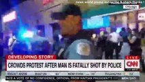 BREAKING NEWS CROWDS PROTEST AFTER MAN IS FATALLY SHOT BY POLICE. CNN NEWS