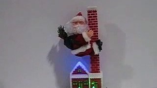 Christmas Toy Show Display: SINGING SANTA CLAUS CLIMBING CHIMNEY