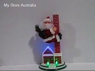 Christmas Toy Show Display: SINGING SANTA CLAUS CLIMBING CHIMNEY