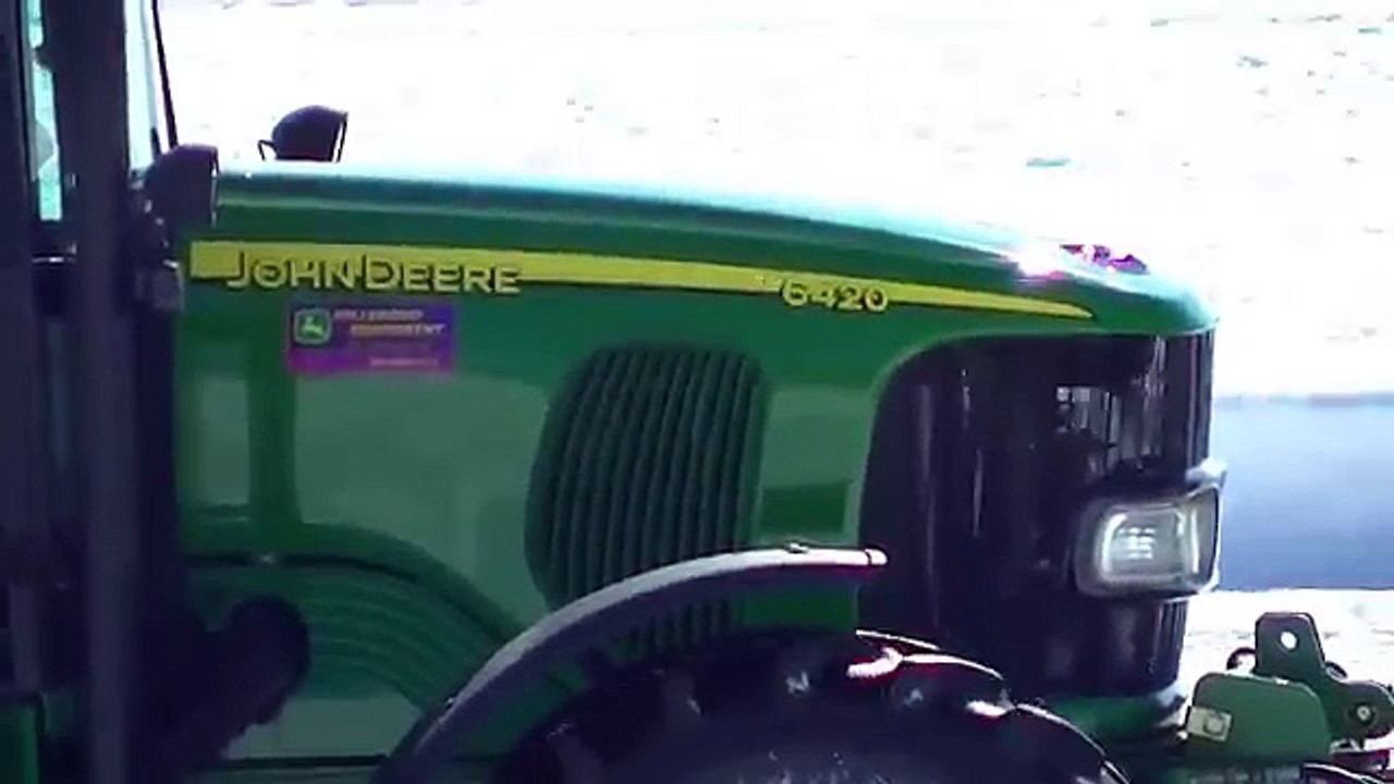 John Deere 6420 with Snow Blower Blowing Snowblower