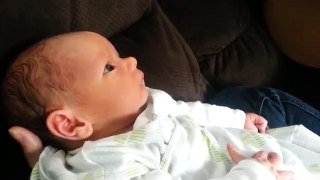 Dad singing to baby Owen at 5 days old