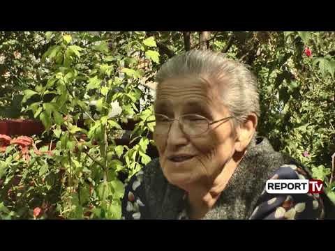 Report TV - Korçë/ E dashuruar me lulet, 80-vjeçarja kthen oborrin e pallatit në lulishte
