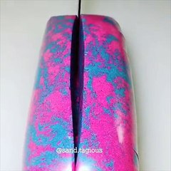 I can't stop watching it!! Credit: youtube.com/sandtagious