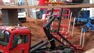 AMAZING R/C TRUCK ACTION will it drop down. AT CONSTRUCTION WORLD Nov new p4