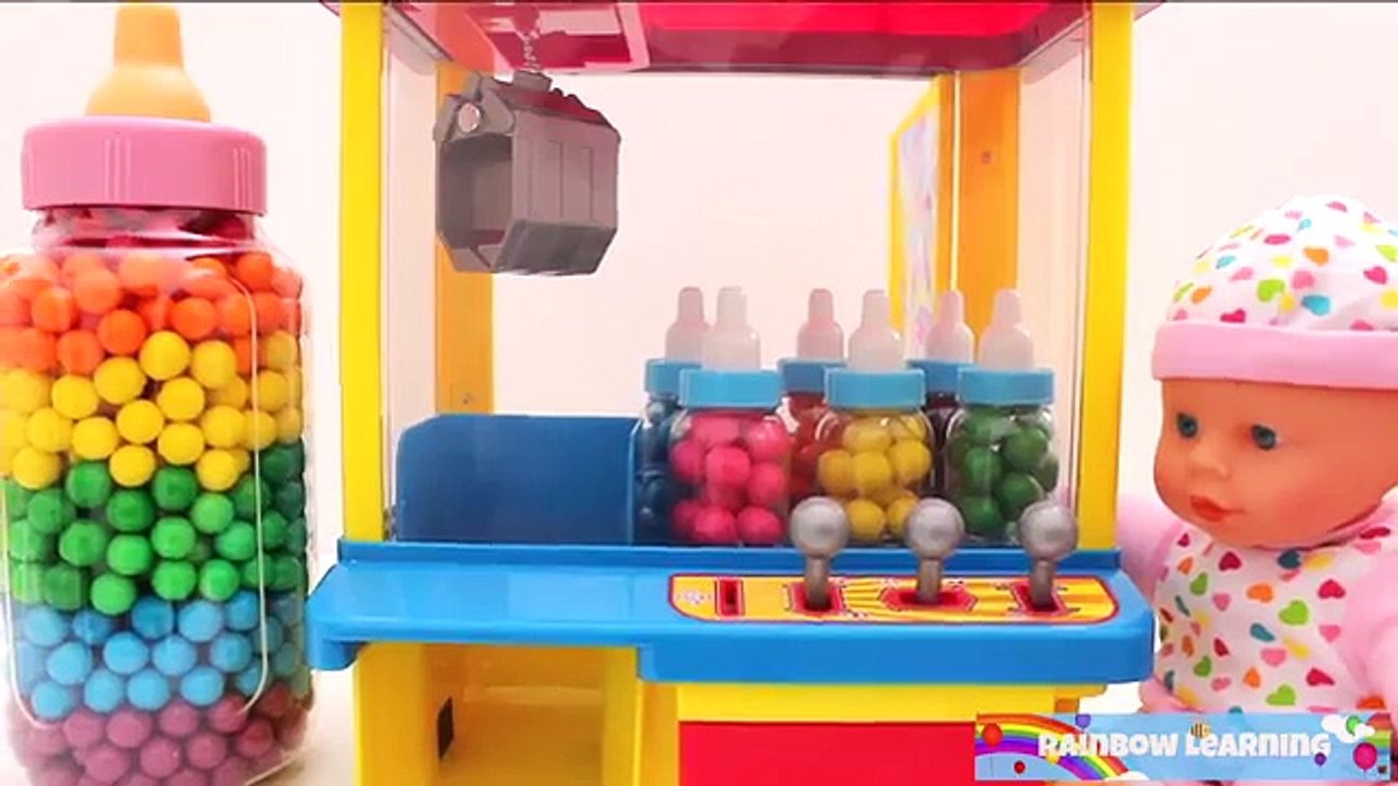 Baby Doll and Toy Claw Machine Game! Learn Colors with Candy Feeding!