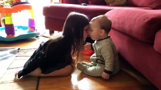 Precious moment between sister and baby brother