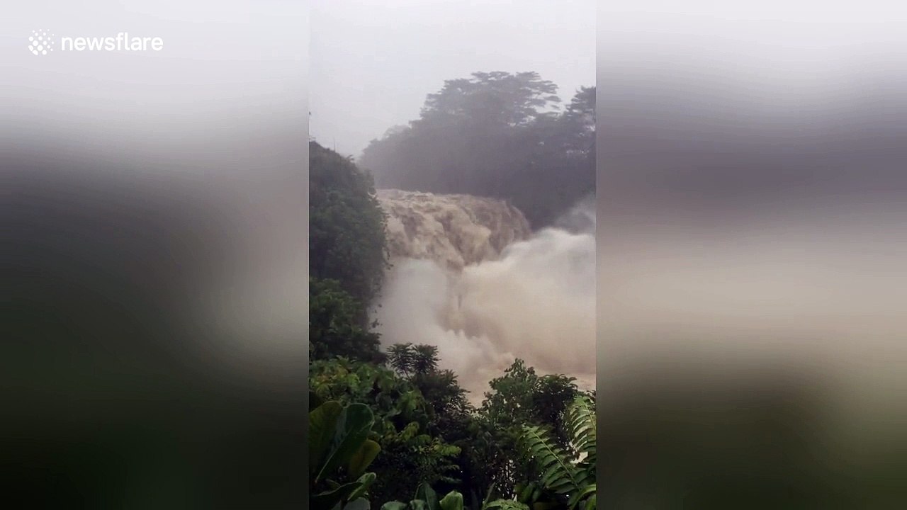 Hurricane Lane turns waterfall into raging cascade of floodwaters