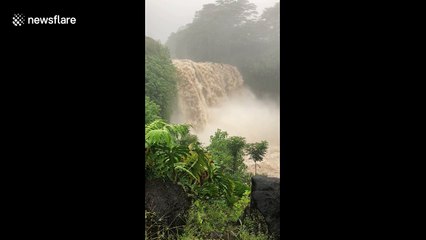 Tranquil waterfall turned into raging cascade of floodwaters as Hurricane Lane intensifies