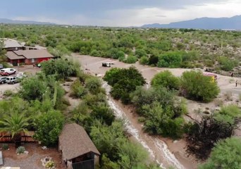 Drone Footage Shows Stranded Vehicle in Tucson Floodwater