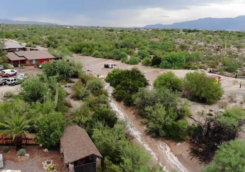 Drone Footage Shows Stranded Vehicle in Tucson Floodwater