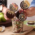 It only takes about an hour to whip up these yummy Chocolate & Caramel Apple Pops! Serve on a stick for easy snacking GET THE RECIPE: