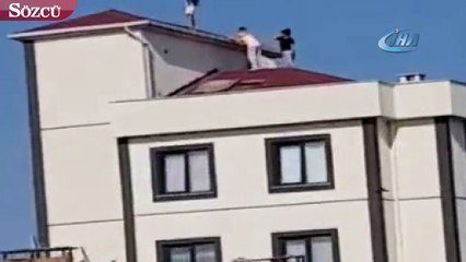 Küçük bir kızı fotoğraf çekmek için çatıya çıkaran sorumsuzlar kamerada