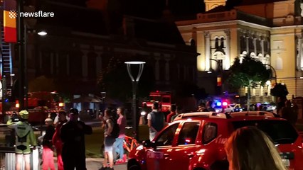 Scores of firefighters battle blaze at Romanian palace