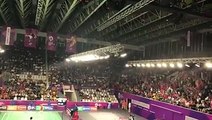 Spectators launching waves of cheers in celebrating Indonesian badminton players' constant victories, including win over Olympic champion Chen Long.