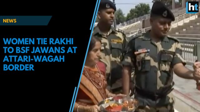 Women tie rakhis to BSF jawans at Attari-Wagah border