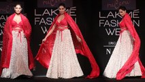 Lakme Fashion Week: Bipasha Basu looks sensuous in Red & White attire; Watch video | FilmiBeat
