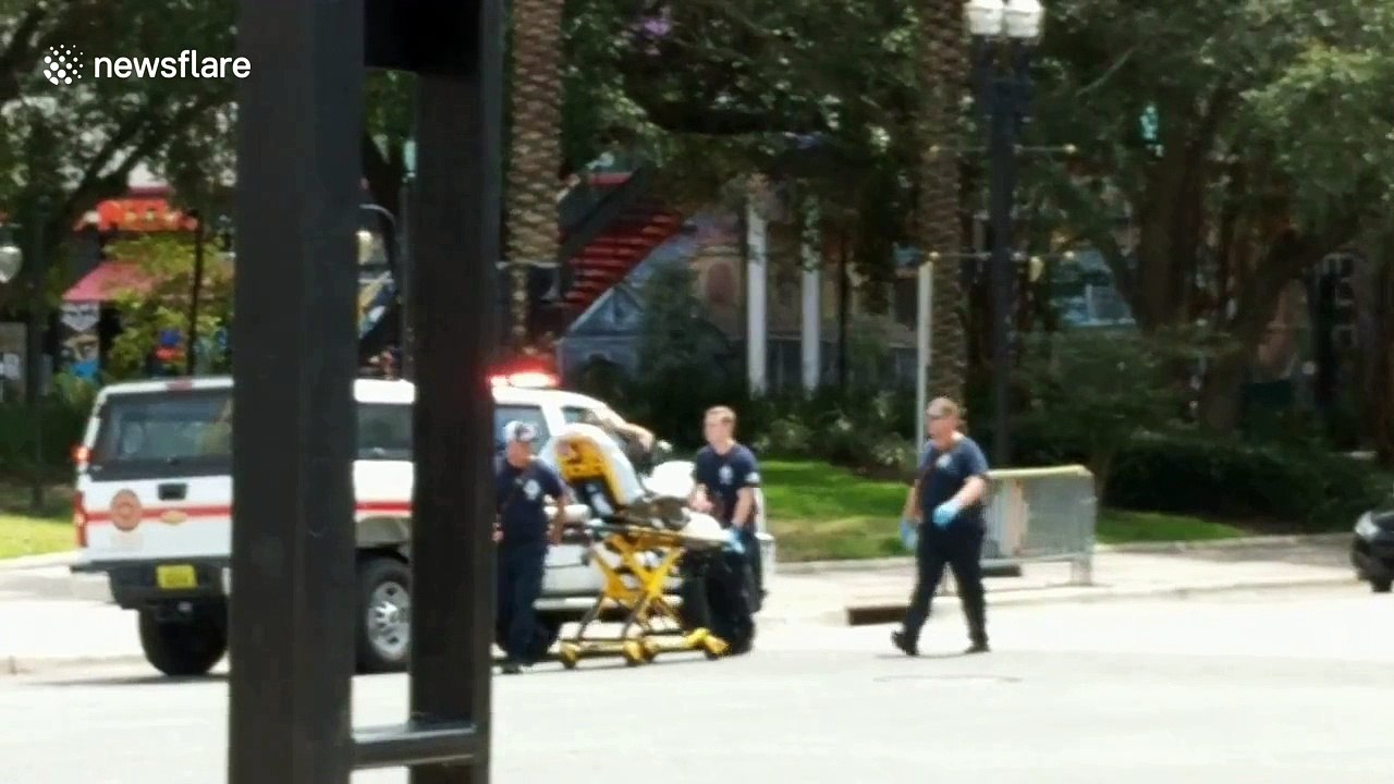 New eyewitness footage from Jacksonville shooting shows victim being taken to ambulance
