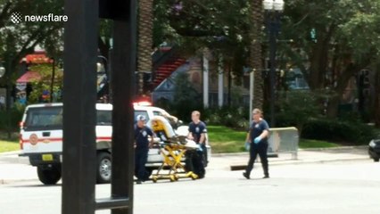New eyewitness footage from Jacksonville shooting shows victim being taken to ambulance