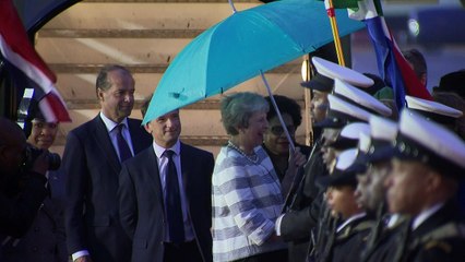 Theresa May arrives in South Africa