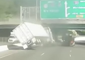 Tractor Trailer Carrying a Load of Candy Takes a Spill