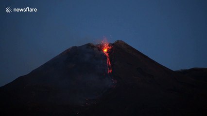 Active Mount Etna spews lava at dawn