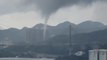 Waterspout Forms in Hong Kong Harbour as Storm Causes Flooding