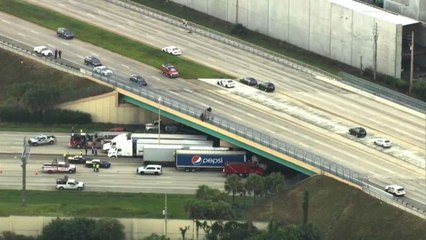 Lifesaving lorries: truckers park beneath bridge in bid to stop suicide