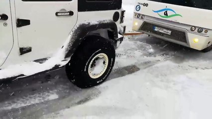 Jeep Rubicon Pulls The Big Bus