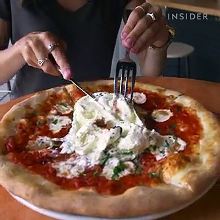An NYC restaurant is blowing up for their Burrata Pizza — and it looks like a cheese lover's dream