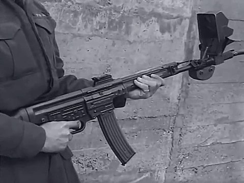 MP43 with 30 degree (Vorsatz J, Gebogener Lauf) deflector unit, C.G. Haenel factory in Suhl, Germany (1945)