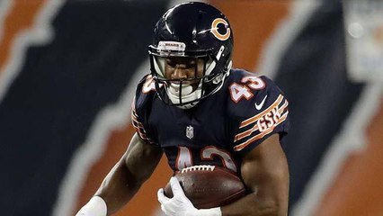 Knile Davis launches through defenders for the TD