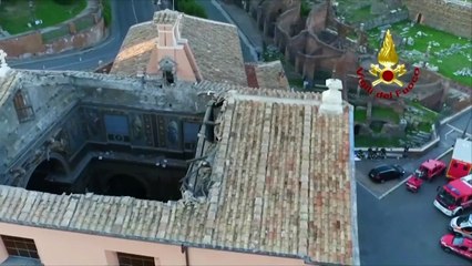 Firefighters rush to save artwork from collapsed church