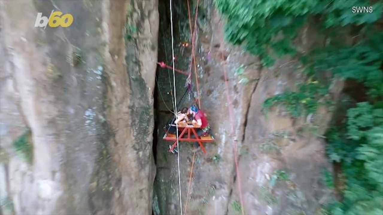 Daredevil Pops the Question on a Bench Suspended Over 300 Feet in the Air