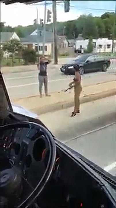 Angry woman destroys a bus,and almost crashed a man to death with her car