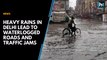 Heavy rains in Delhi lead to waterlogged roads and traffic jams