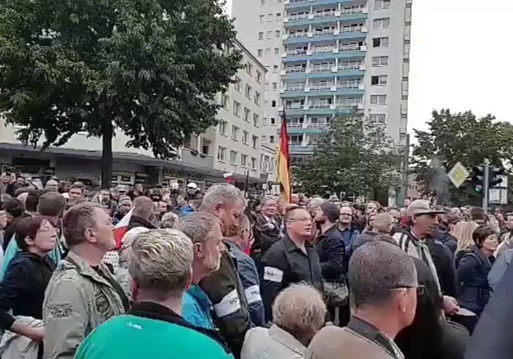 Demonstrators Holding German Flags Gather in Chemnitz
