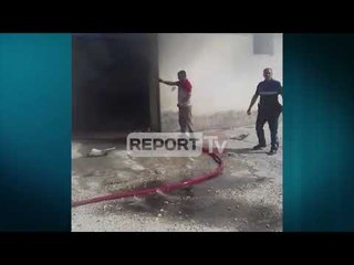 Report Tv- Fier, shkrumbohen nga zjarri  Magazina e kafes