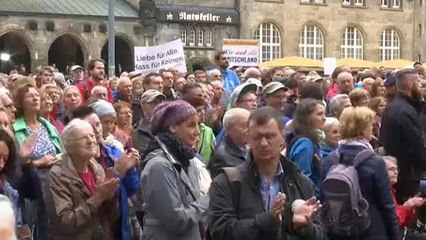 Manifestação contra a xenofobia e violência na Alemanha