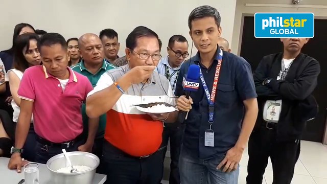Piñol accepts challenge, eats bukbok rice