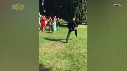 Watch Wedding Attendee Take Off Running After His Girlfriend Catches Bride's Bouquet