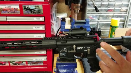 removing charging handle