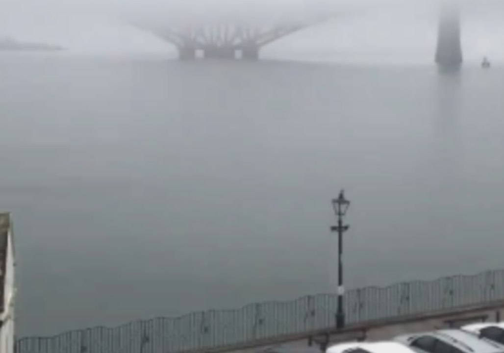 Timelapse of Edinburgh's Forth Rail Bridge Emerging From Behind Heavy Fog
