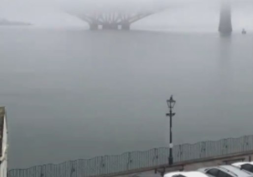 Timelapse of Edinburgh's Forth Rail Bridge Emerging From Behind Heavy Fog