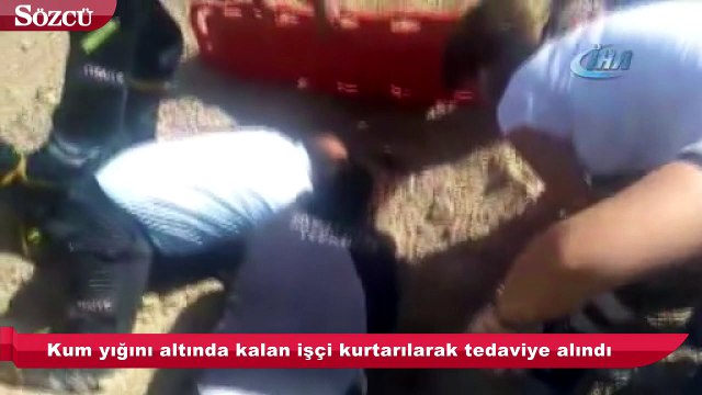 Kum yığını altında kalan işçi kurtarıldı