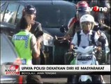 Aksi Simpatik Polwan Atur Lalu Lintas Sambil Berjoget